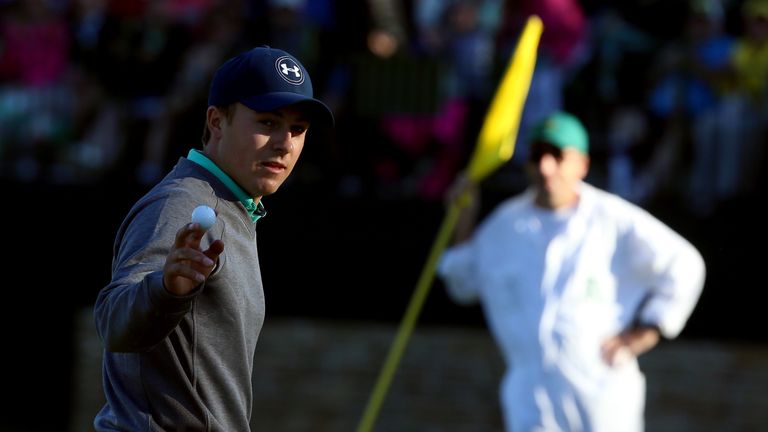 Jordan Spieth of the United States reacts to his birdie on the 15th green during the third round of the 2016 Masters Tourname