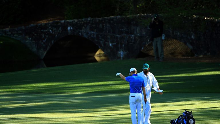 Jordan Spieth of the United States takes his first drop on the 12th hole at Augusta