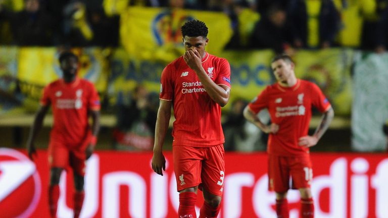 Liverpool players look dejected after Villarreal's late winner