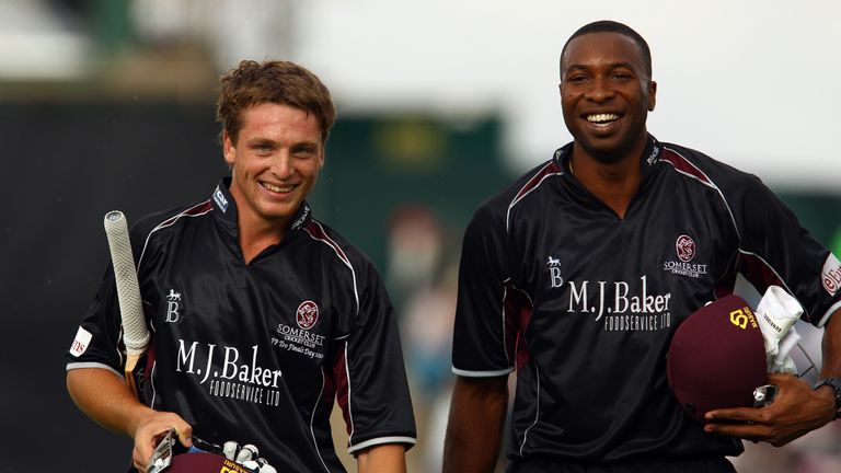 Jos Buttler (L) and Kieron Pollard of Somerset walk off after the end of the innings during the Friends Provident T20 semi-final