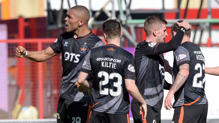 Kilmarnock's Josh Magennis (left) celebrates as his shot deflects off Hamilton's Danny Redman into the back of the net for an own goal 