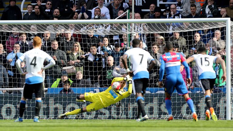 Newcastle United goalkeeper Karl Darlow saves a penalty from Crystal Palace's Yohan Cabaye