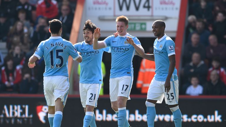 Kevin de Bruyne (2nd R) of Manchester City celebrates scoring his team's second goal with his team mates