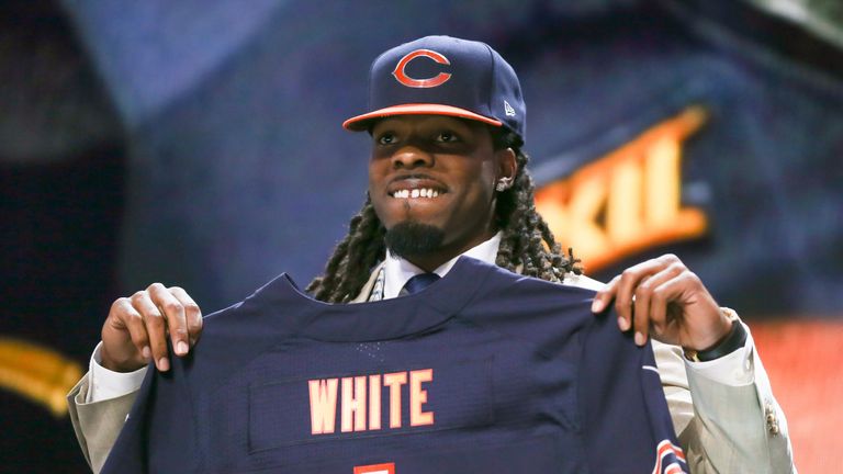 Kevin White of the West Virginia Mountaineers holds up a jersey after being chosen #7 overall by the Chicago Bears during the firs