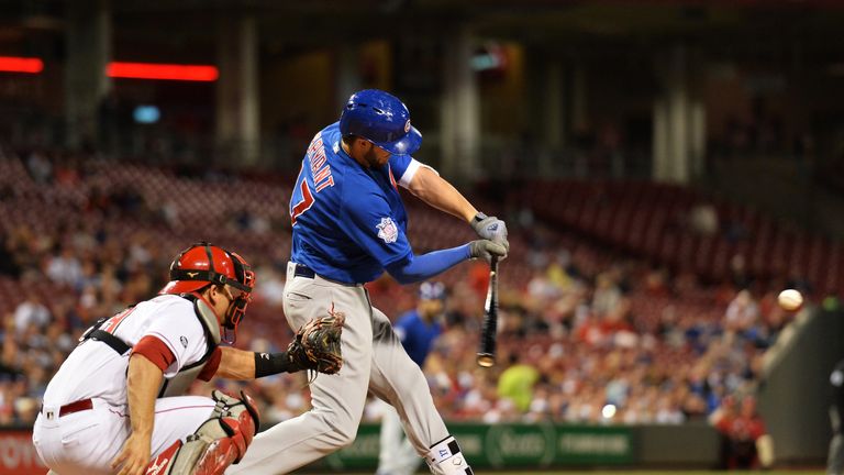 CINCINNATI, OH - APRIL 21:  Kris Bryant #17 of the Chicago Cubs connects for a grand slam home run in the seventh inning against the Cincinnati Reds 