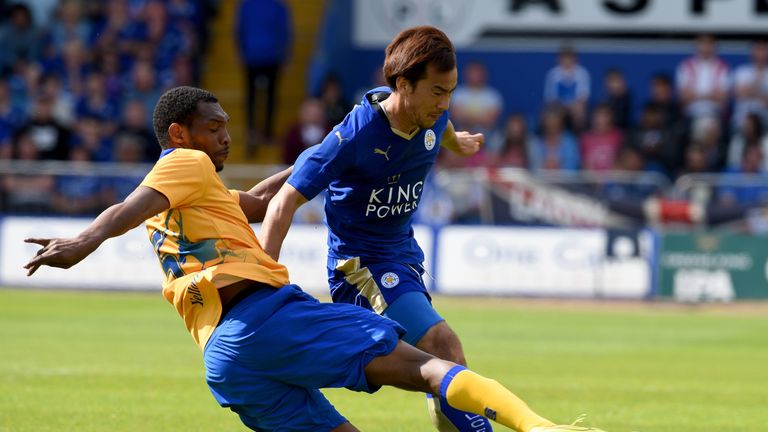 MANSFIELD, ENGLAND - JULY 25:  Shinji Okazaki of Leicester City is challenged by Krystian Pearce of 