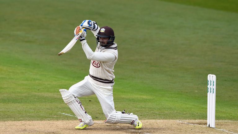 Surrey batsman Kumar Sangakkara cover drives during Day two of the Specsavers County Championship Division One match