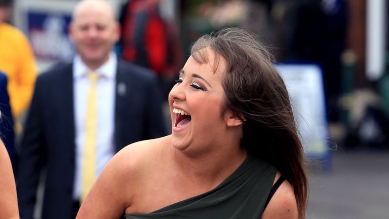 A female racegoer during Ladies Day of the Crabbie's Grand National 