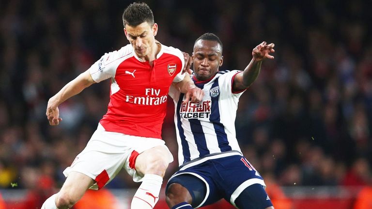 Saido Berahino (r) of West Brom challenges Arsenal's Laurent Koscielny during Thursday's match