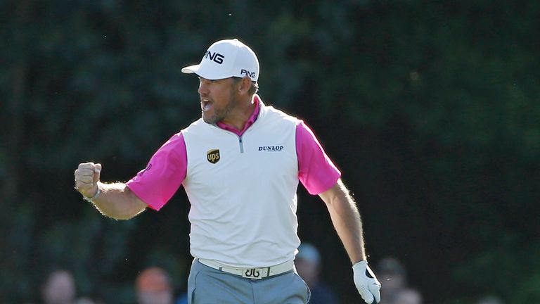 Lee Westwood reacts after an eagle on the 15th hole