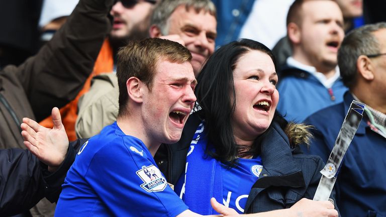 Leicester City fans show their emotions as they celebrate victory