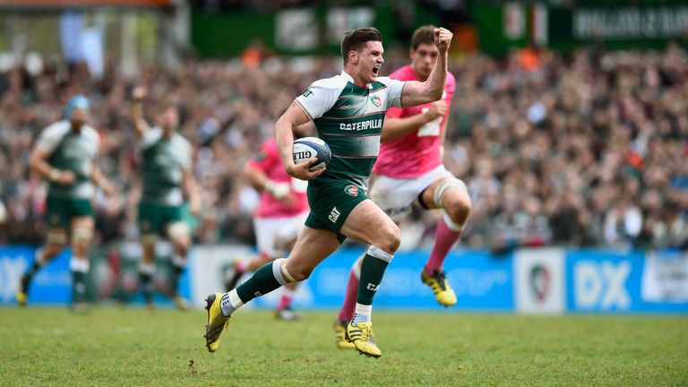 Tigers player Freddie Burns races away to score the third try