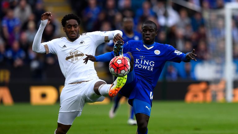 Leroy Fer and N'golo Kante battle for the ball