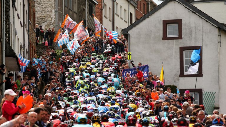 The Peloton climb through the town of Houffalize during the 101st Liege-Bastogne-Liege cycle road race on April 26, 2015 in Lie