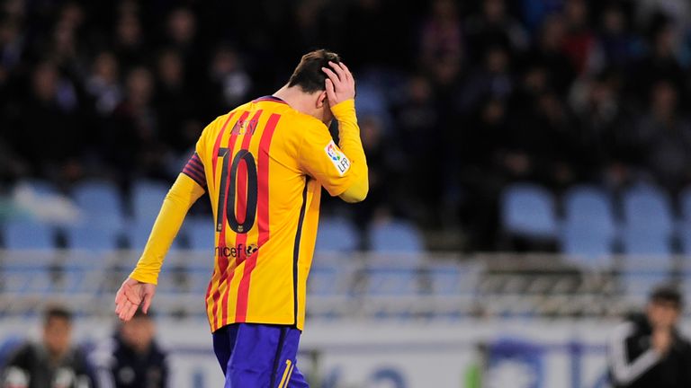 Lionel Messi walks on the pitch during the Spanish league football match Real Sociedad vs FC Barcelona at the Anoeta stadium.