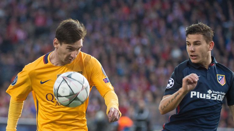 Lionel Messi battles with Lucas Hernandez
