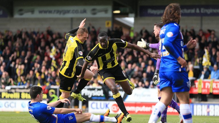 Burton Albion's Lucas Akins (centre) celebrates scoring his side's first goal of the game against Gillingham, Sky Bet League One