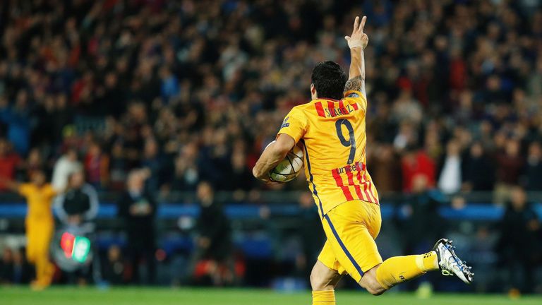 Luis Suarez celebrates after scoring for Barcelona against Atletico Madrid in the Champions League quarter-final first leg