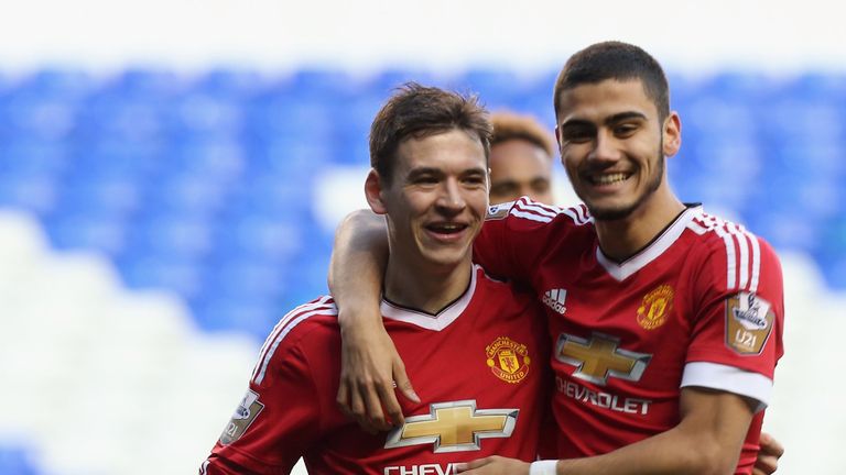  Donald Love (left) celebrates scoring United's first goal