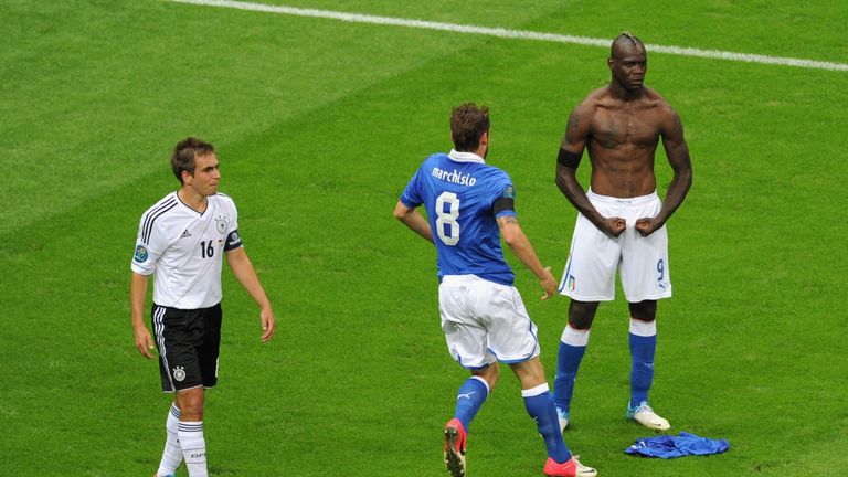 WARSAW, POLAND - JUNE 28:  Mario Balotelli (R) of Italy celebrates with team-mate Claudio Marchisio after scoring 