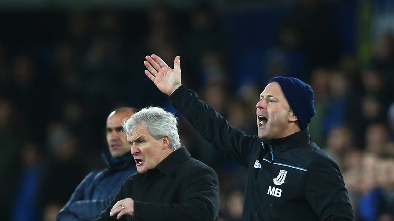 Stoke City manager Mark Hughes (left) with assistant manager Mark Bowen