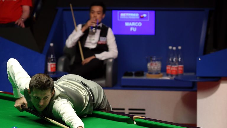 Mark Selby of England in action during his semi final match against  Marco Fu of Hong Kong 