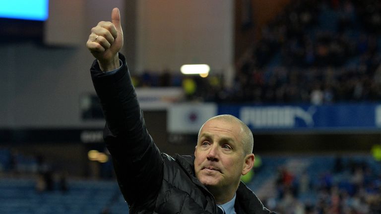 GLASGOW, SCOTLAND - APRIL 5 : Rangers manager Mark Warburton celebrates on the pitch as Rangers beat Dumbarton 1-0 to clinch the Scottish Championship titl