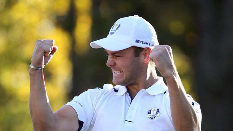 MEDINAH, IL - SEPTEMBER 30:  Martin Kaymer of Europe celebrates after making the putt that retained the Ryder Cup on the the 18th green in his match agains