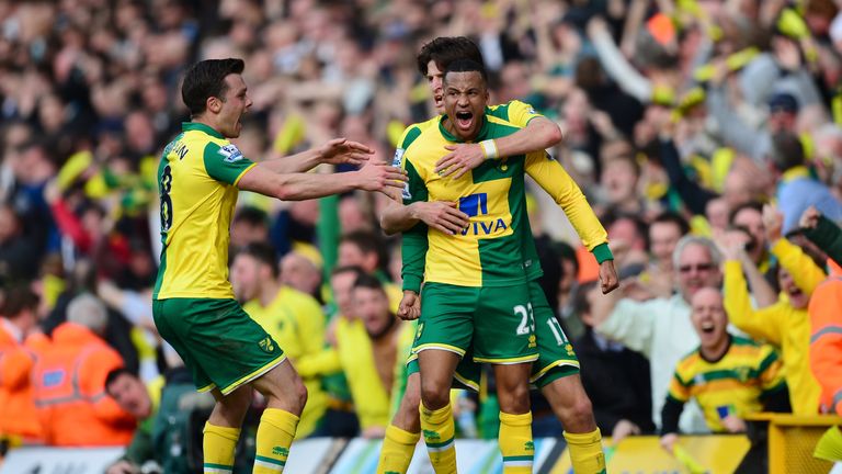 Norwich's Martin Olsson is congratulated after scoring the late winner