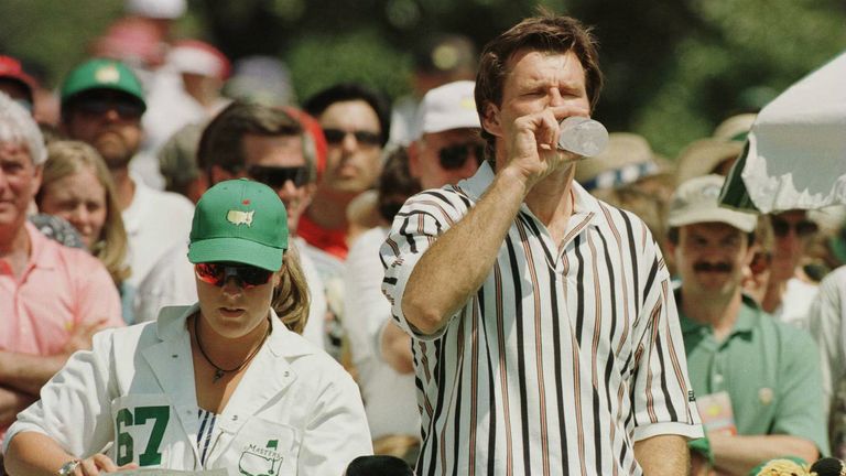 Sunesson checks her notes as Faldo takes on refreshment during the final day