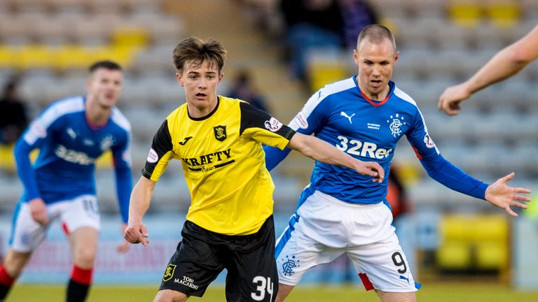 Kenny Miller (right) closes down on reported Rangers target Matthew Knox