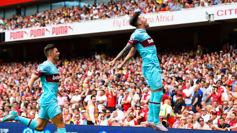 Mauro Zarate (r) celebrates his goal for West Ham against Arsenal