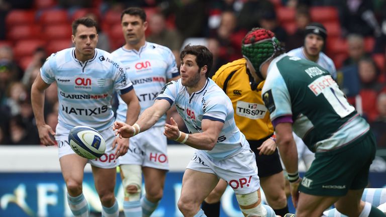 Maxime Machenaud (3rd L) of Racing Metro 92 passes the ball during the European Champions Cup semi-final rugby union match between Leicester Tigers