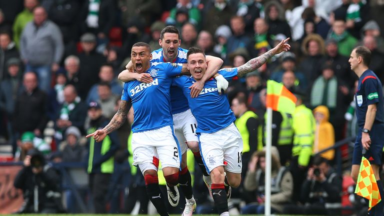Barrie McKay (right) celebrates with his team-mates after scoring Rangers' second goal against Celtic