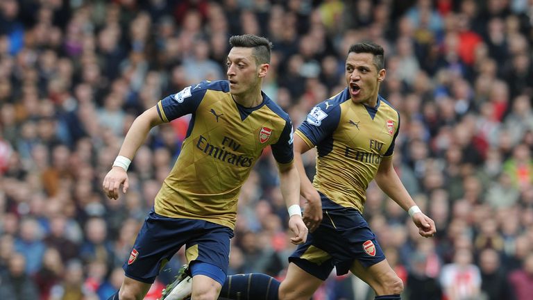 Mesut Ozil and Alexis Sanchez during the Premier League match between West Ham United and Arsenal at The Boleyn Ground, on 9th April 2016