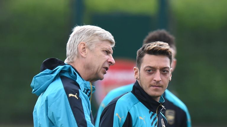 Ozil says he's determined to win the Premier League title for Arsenal manager Arsene Wenger