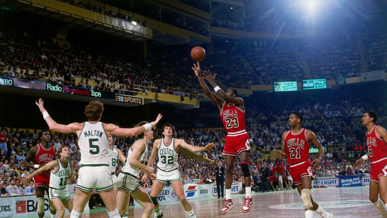 BOSTON - 1986:  Michael Jordan #23 of the Chicago Bulls shoots a jump shot against Danny Ainge #44 of the Boston Celtics during an NBA game played in 1986 