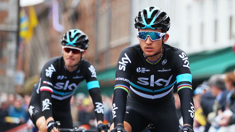 Michal Kwiatkowski (R) and Michal Golas (L) of Poland and Sky make their way to the start prior to the 100th edition of the Tour of Flanders