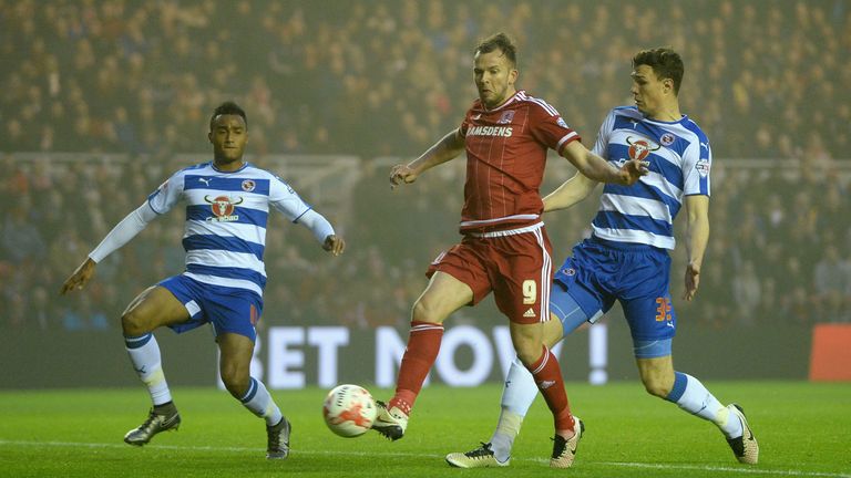 MIDDLESBROUGH, ENGLAND - APRIL 12:  Jordan Rhodes of Middlesbrough gets past Jordan Obita and Jake Cooper of Reading during the Sky Bet Championship match 