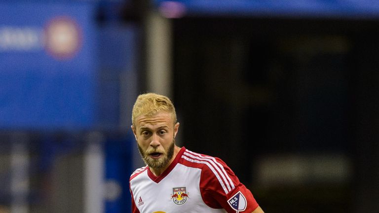 MONTREAL, QC - MARCH 12:  Mike Grella #13 of the New York Red Bulls plays the ball during the MLS game against the Montreal Impact at the Olympic Stadium o