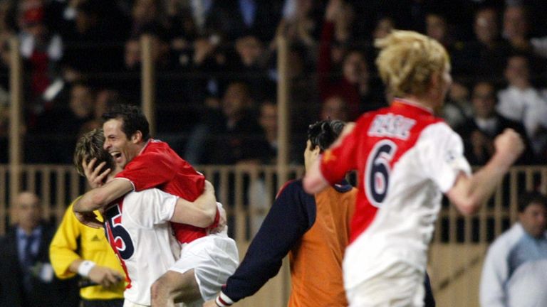 MONACO, MONACO:  Monaco teammates jubilate after winning their Champions League quarter-final second leg football match against Real Madrid, 06 April 2004 