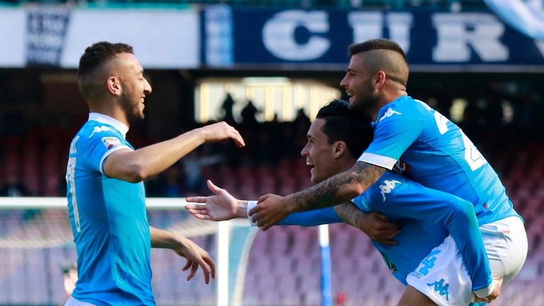 Napoli's Jose Maria Callejon (C) celebrates with teammates Lorenzo Insigne (R) and Napoli's Omar El Kaddouri