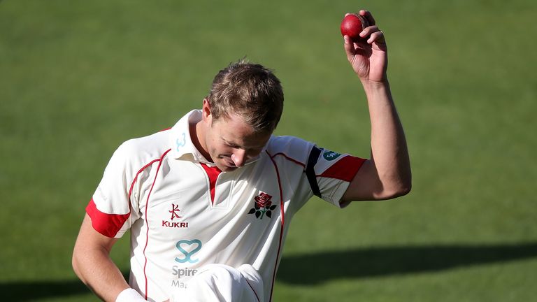 MANCHESTER, ENGLAND - APRIL 17:  Neil Wagner of Lancashire acknowledges the applause after taking six wicket on debut during day one of the Specsavers Coun