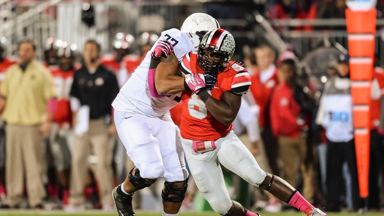 COLUMBUS, OH - OCTOBER 26:  Noah Spence #8 of the Ohio State Buckeyes rushes against the Penn State Nittany Lions at Ohio Stadium on October 26, 2013 in Co