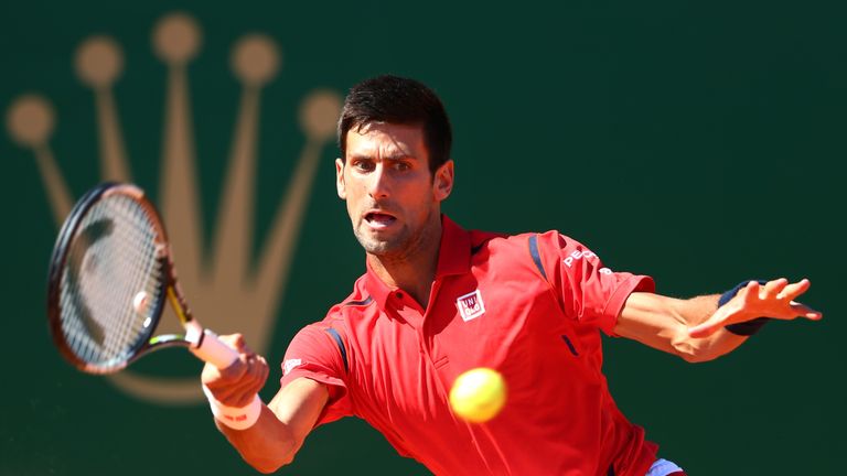 Novak Djokovic hits a forehand return in his second round loss to Jiri Vesely