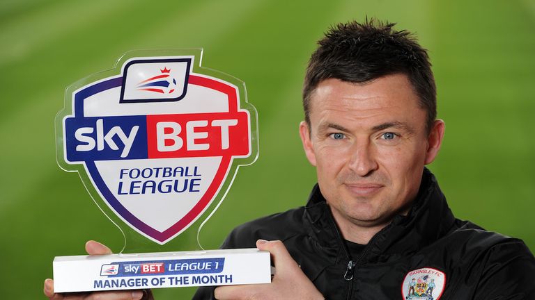 Sky Bet League One Manager of the Month for March 2016 Paul Heckingbottom with his award at the club's Oakwell Stadium.