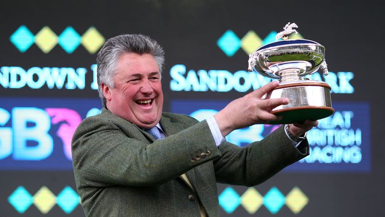 ESHER, ENGLAND - 23 APRIL: Paul Nicholls celebrates after being crowned Champion Trainer at Sandown racecourse on April 23, 2016 in Esher, England. (Photo 