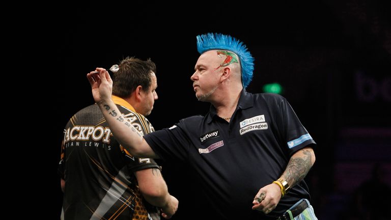 BETWAY PREMIER LEAGUE DARTS.SHEFFIELD ARENA,SHEFFIELD.PIC;LAWRENCE LUSTIG.ADRIAN LEWIS V PETER WRIGHT.PETER WRIGHT IN ACTION