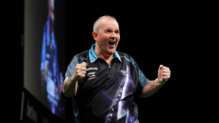 Phil Taylor celebrates his win over Michael Smith (Pic: Lawrence Lustig)