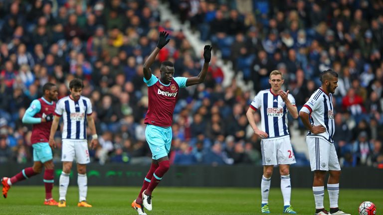 Cheikhou Kouyate of West Ham celebrates scoring his team's first goal against West Brom